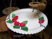 http://lakesidedecoys.com/images/tn_strawberry_birdfeeder.jpg